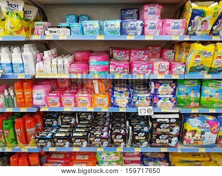 CHIANG RAI THAILAND - NOVEMBER 27: various brand of Sanitary napkins in packaging for sale on supermarket stand or shelf in Seven Eleven on November 27 2016 in Chiang rai Thailand