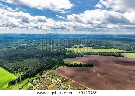 Northern landscape. Endless forests. Plow. Air view