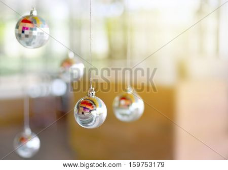 Disco ball or mirror balls on ceiling party decoration copy space.