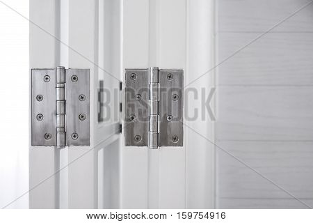 Door hinge on wooden door vintage style