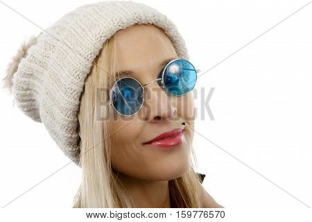 Portrait of a beautiful blond middle-aged woman with sun glasses