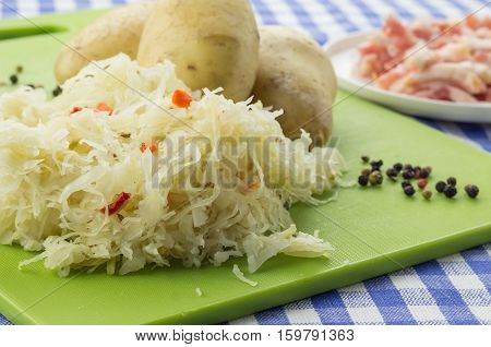 Ingredients For Typical Dutch Dish Zuurkool With Sauerkraut And Potatoes