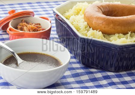 Typical Dutch Dish Zuurkool With Sauerkraut, Smoked Sausage And Gravy