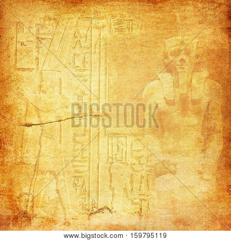 Pharaoh and hieroglyphics on a grunge sandy texture