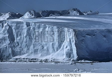 Antarctica, Weddell Sea, Riiser Larsen Ice Shelf, Iceberg with Emperor Penguins