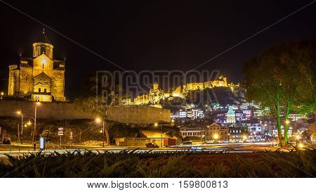 Night View Of The Metekhi Church, The Equestrian Statue Of King Vakhtang Gorgasali And Fortress Nari