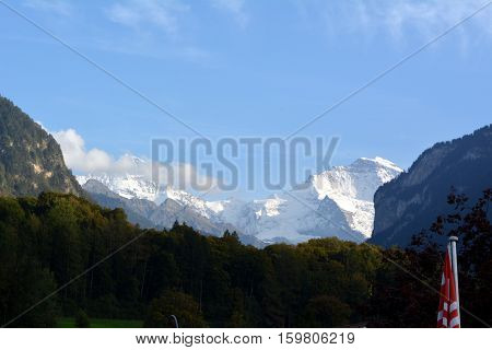 snowy peak of the Jungfrau mountain in daylight