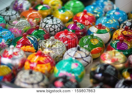 Colorful lacquered boxes in China town Singapore