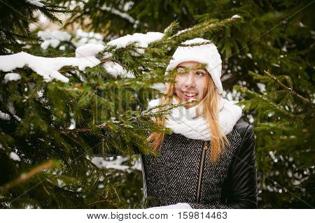 Young Woman In A Forest With Fir And Pine Trees On The Streets, Tree Branches Touching Hands, Brushi