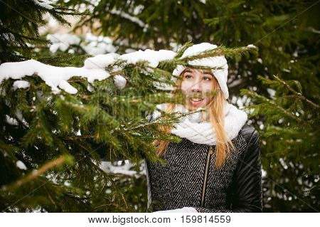 Young Woman In A Forest With Fir And Pine Trees On The Streets, Tree Branches Touching Hands, Brushi