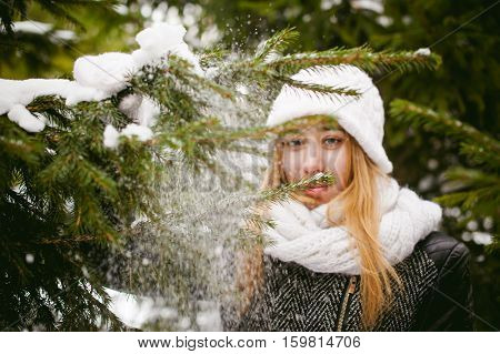 Young Woman In A Forest With Fir And Pine Trees On The Streets, Tree Branches Touching Hands, Brushi