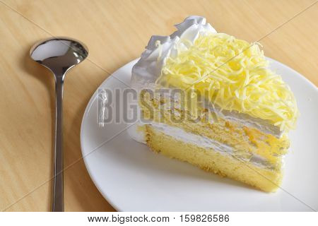 piece of cake with whip cream and grated cheese toppingselective focus.