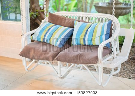 beautiful modern chair in garden selective focus.