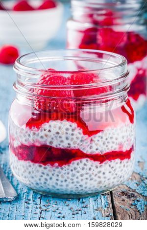 Chia Pudding With Raspberry Sauce And Fresh Raspberries