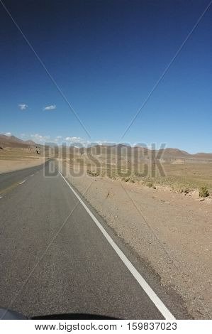 View of endless highway in the Chilean desert