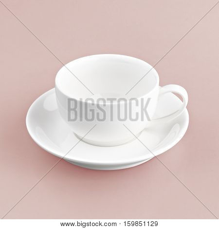 white cup on red orange background solid