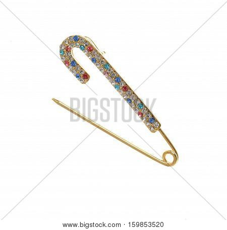 elegant safety pin broche isolated on white background