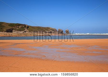 LIENCRES DUNES SPAIN - AUGUST 21: View of the Liencres dunes nature reserve in the Cantabrian sea on August 21 2016