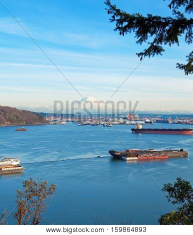 Tacoma Port With Cargo Ships And Volcano Mt. Ranier.