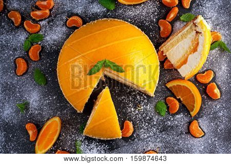 Orange Cake witch mousse, Mandarin sauce and fruit.