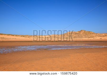 LIENCRES DUNES SPAIN - AUGUST 21: View of the Liencres dunes nature reserve in the Cantabrian sea on August 21 2016