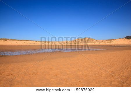 LIENCRES DUNES SPAIN - AUGUST 21: View of the Liencres dunes nature reserve in the Cantabrian sea on August 21 2016
