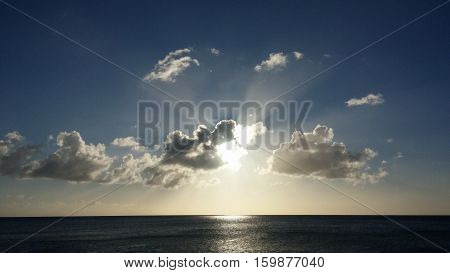 Light rays all around a sunset over the ocean. Turks and caicos islands.