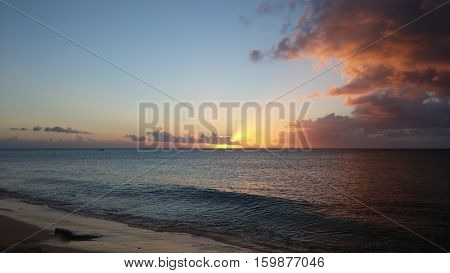 Sunset with light rays over the ocean. Turks and caicos islands.