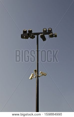 Security CCTV camera on street lamp in the city center