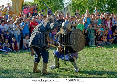 Kharkiv Ukraine - September 10 2016: Reconstruction of a medieval duel with swords during the ethnographic festival in Kharkiv region