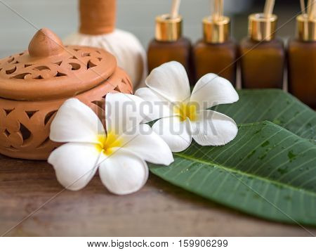Spa massage compress balls herbal ball on the wooden with treaments spa Thailand select focus