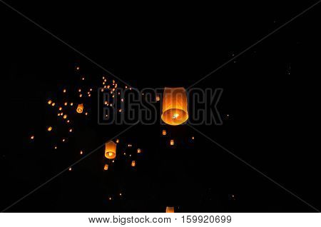 Floating lanterns ceremony or Yee Peng ceremony, traditional Lanna Buddhist ceremony in Chiang Mai, Thailand