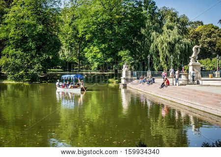 WARSAW POLAND - SEPTEMBER 27: View of the Lazienki canal near the Palace on the Water in Lazienki Park or Royal Baths Park in Warsaw Poland on September 27 2016