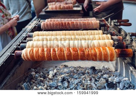 Trdelnik bakery on the street market in Prague, Czech Republic. Czech sweetness