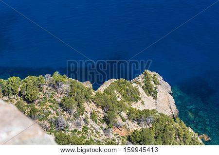 Sea waves and rocks on the steep west coast of Mallorca.