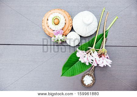 Spa massage compress balls herbal ball on the wooden with treaments spa Thailand select focus