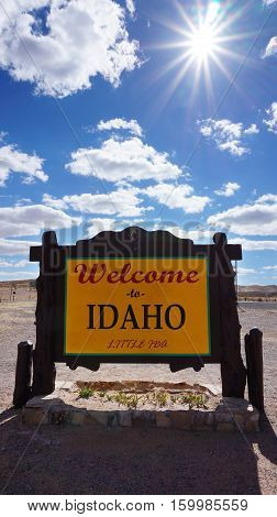 Welcome to Idaho road sign with blue sky