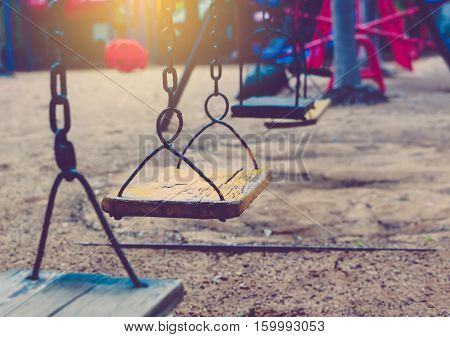 Empty chain swing in playground in park