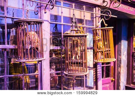 Leavesden, London, UK - 1 March 2016: Shops  windows display with magic objects in Diagon Alley from Harry Potter film. Warner Brothers Studio