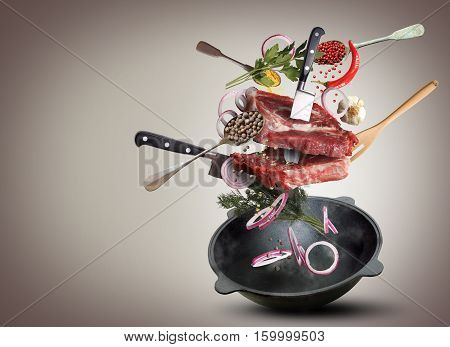 Meat and beef meatballs with vegetables and utensils