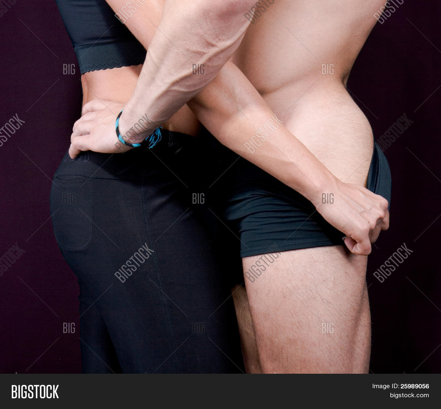 Couple In Passionate Embrace And Undressing Each Other During Sexual Foreplay Couple In Passionate Embrace And Undressing Each Other During Sexual Foreplay