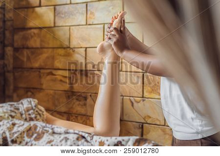 Total Relaxation. Beautiful Young Wwoman Get Balinese Or Thai Massage