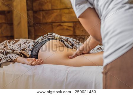 Total Relaxation. Beautiful Young Wwoman Get Balinese Or Thai Massage