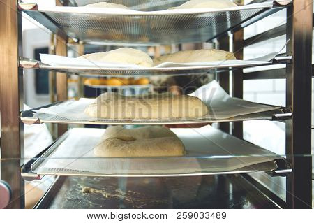Billets Of Bakery Products On The Shelves Before Baking In The Oven.