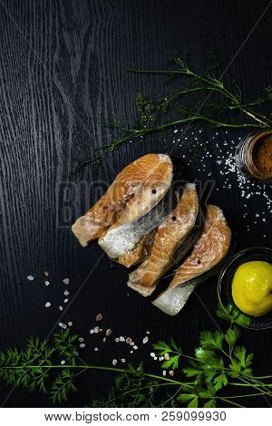 Fresh Trout Or Salmon Fish With Spices On Wooden Background