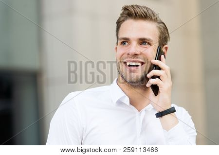 Happy To Hear You. Man Well Groomed Speak Mobile Phone Urban Background. Businessman Cheerful Call F