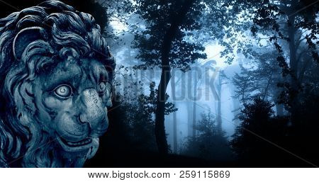 Ancient lion statue and mysterious landscape of foggy forest 