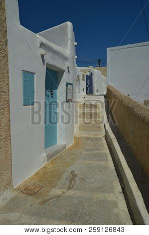 Typical Narrow And Serpentant Streets At Pyrgos Kallistis On The Island Of Santorini. Travel, Cruise