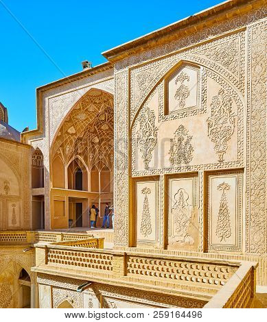 Kashan, Iran - October 22, 2017: The Complex Stucco Decors On Walls And Portal Of The Large Courtyar