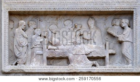 MODENA, ITALY - JUNE 04: Panel with episodes of the life of St. Geminiano, by Agostino di Duccio of about 1442, Modena Cathedral, Italy on June 04, 2017.